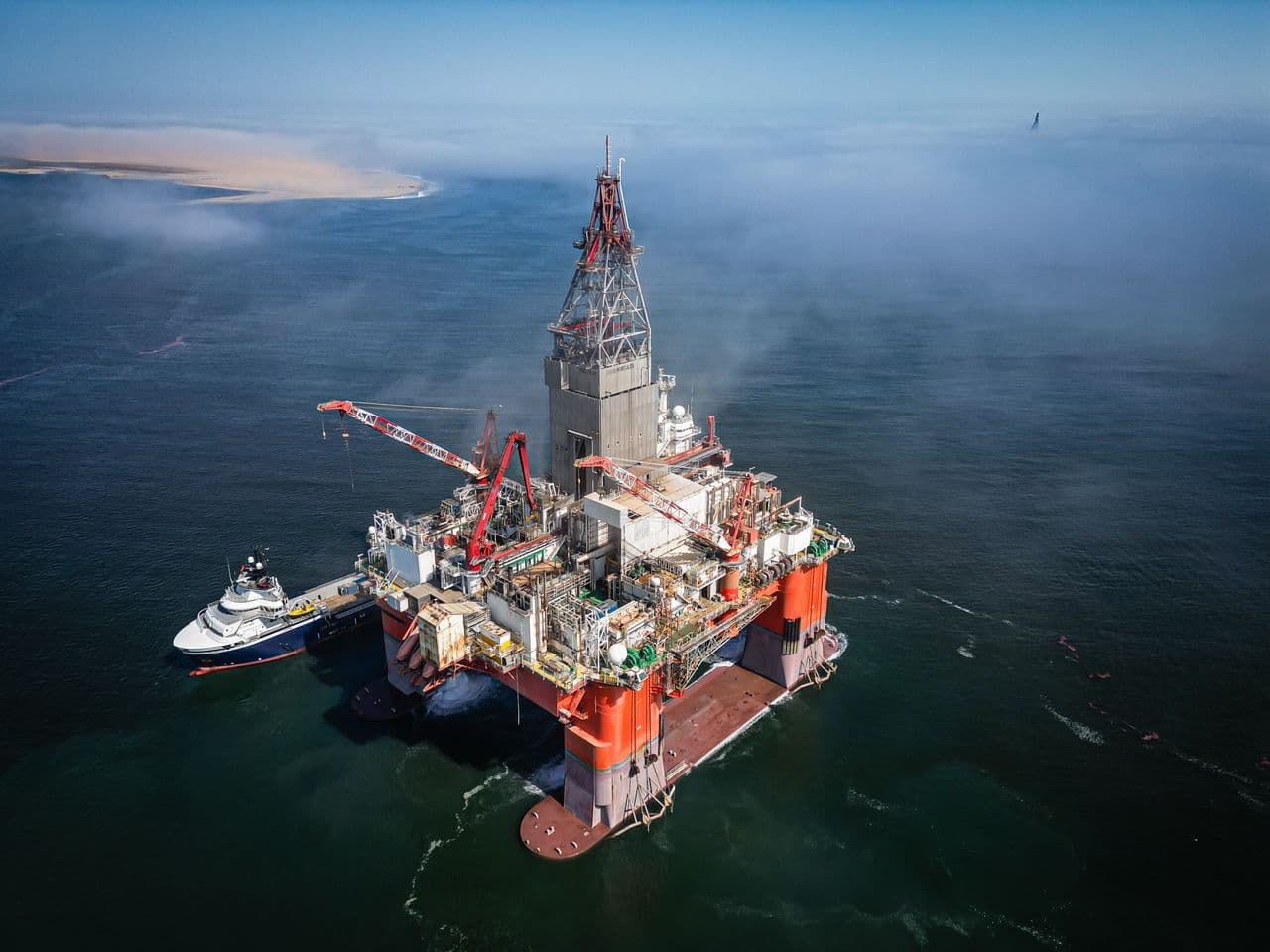Aerial photograph of Hercules with a vessel alongside